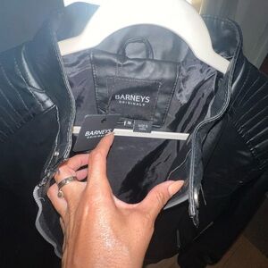 Brand new black leather jacket.